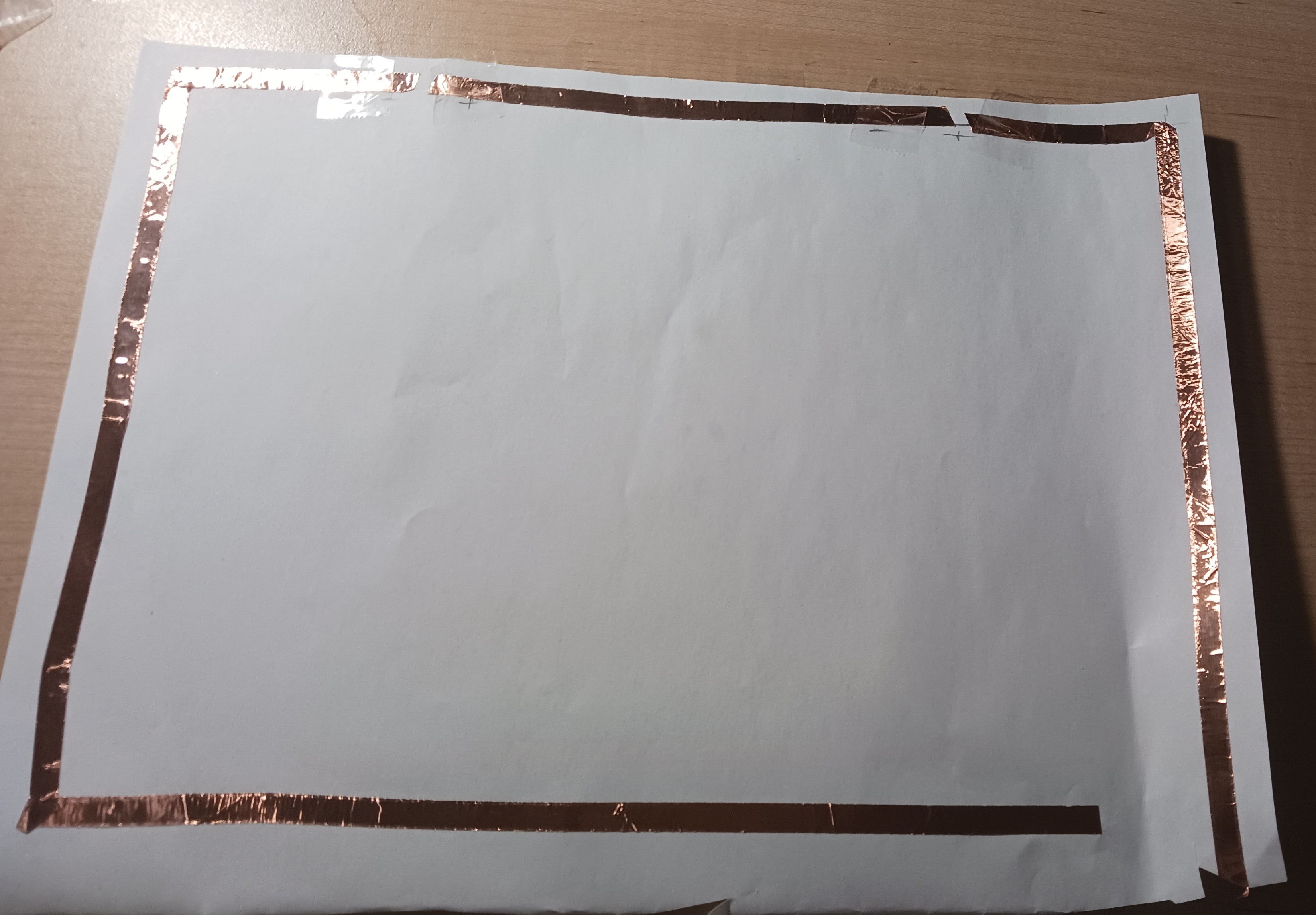 Laying down copper tape for series circuit